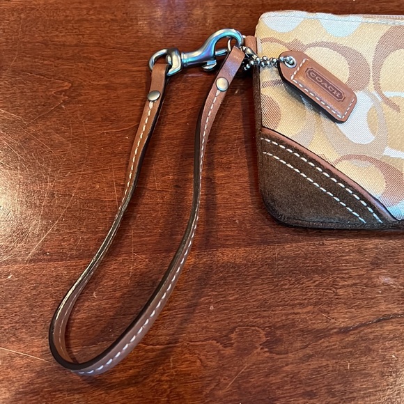 Coach wristlet bag, 7 x 4 inches, 13 inch strap, suede front corners, top zip - Picture 4 of 5